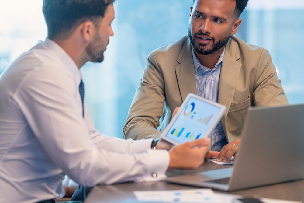 Two men discussing financial planning