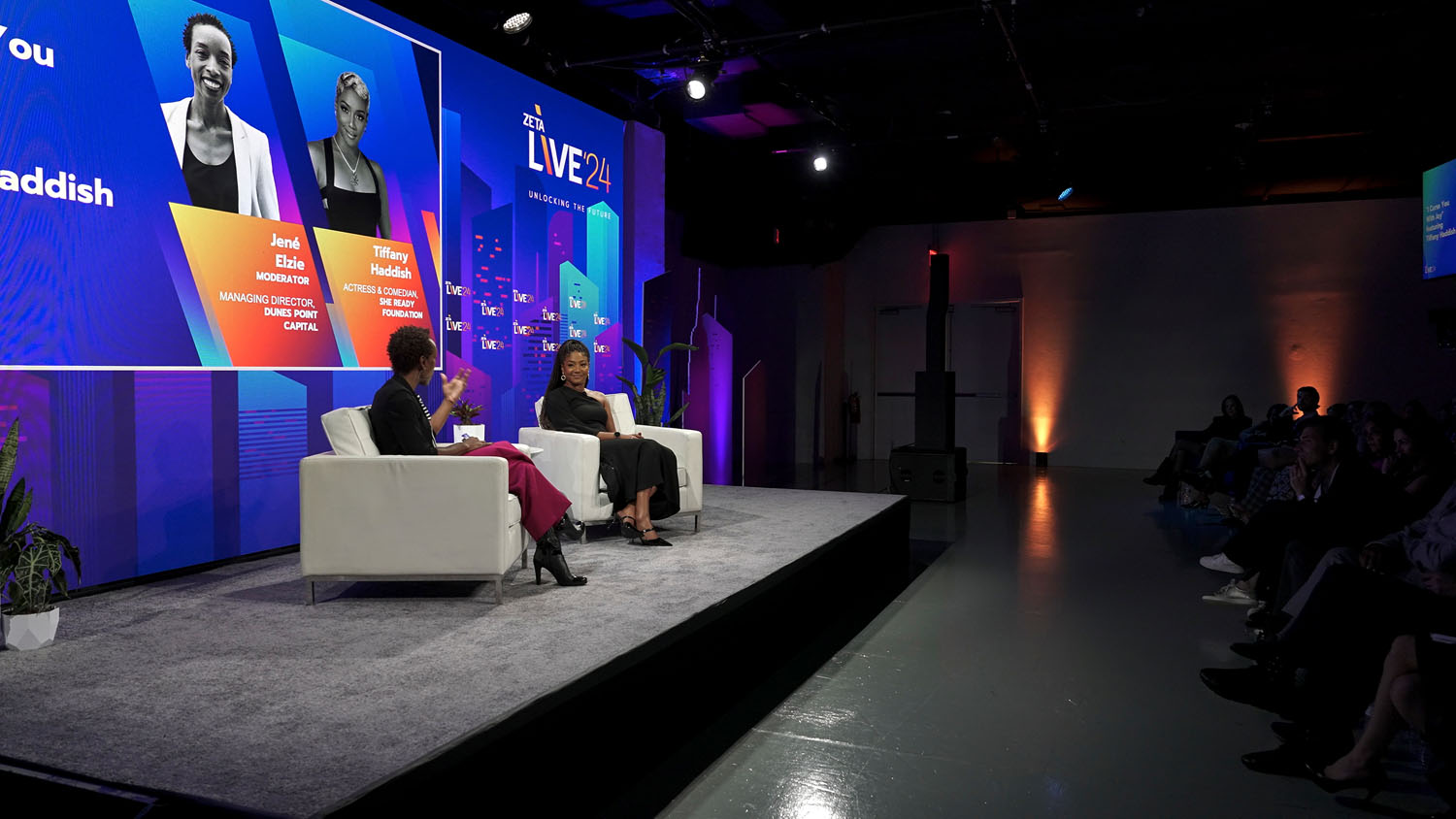 Jené Elzie and Tiffany Haddish at Zeta Live 2024, sharing insights on personal branding, leadership, and navigating careers in entertainment and business.