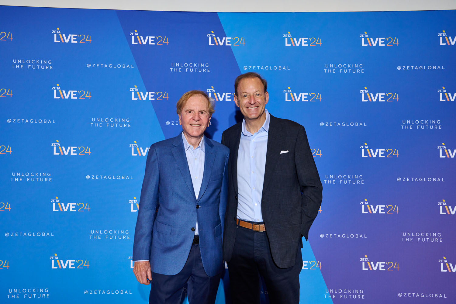 John Sculley, co-founder of Zeta Global and former CEO of Apple, with David A. Steinberg, co-founder and CEO of Zeta Global, at Zeta Live 2024, discussing innovation and AI-driven business strategies.