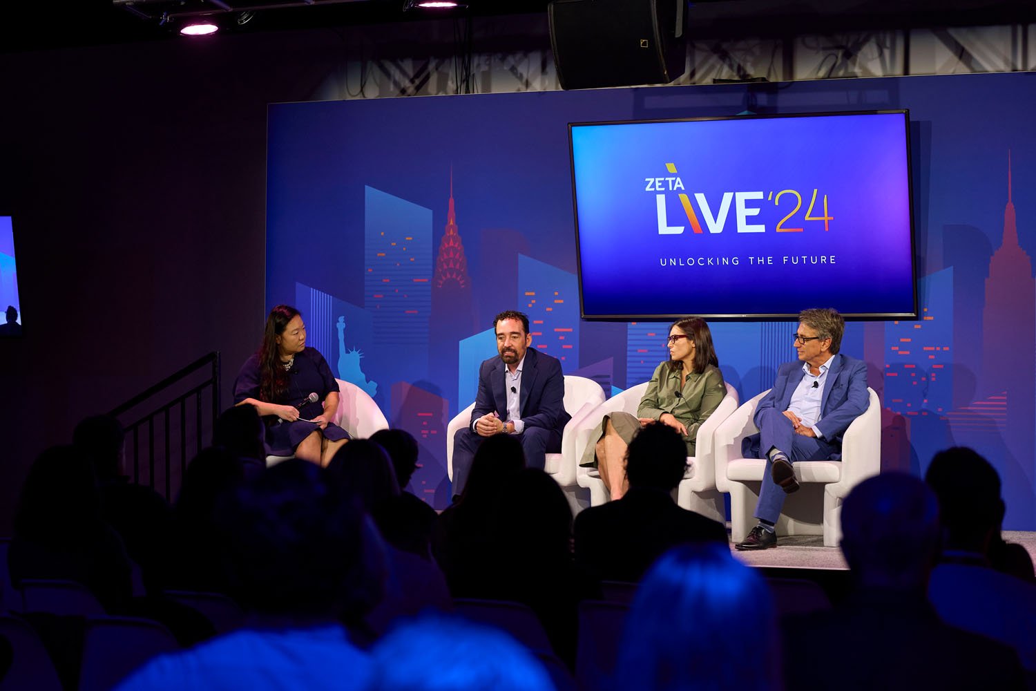 Winnie Shen, Trever Bezdek, Kate Shamsuddin, and Jeffrey McCollum at Zeta Live 2024 discussing digital transformation and AI in marketing.